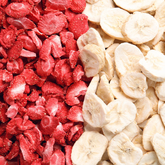 Dried strawberries and banana slices arranged side by side.