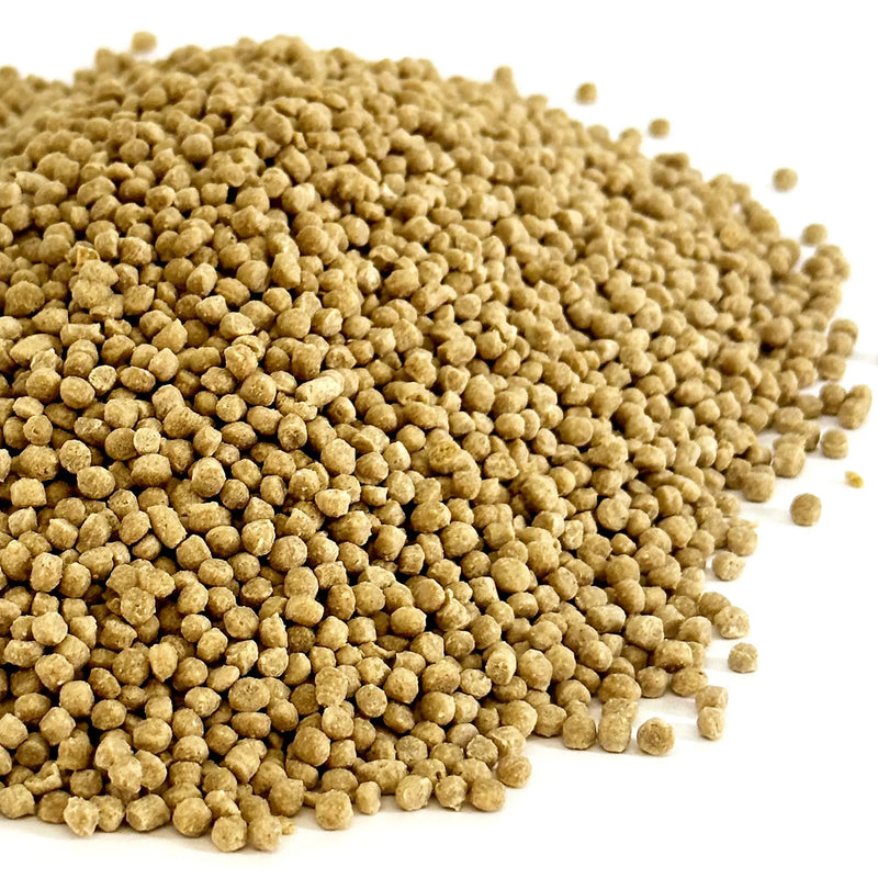 Load image into Gallery viewer, Close-up of a pile of brown harrison's adult lifetime fine  bird food pellets on a white background
