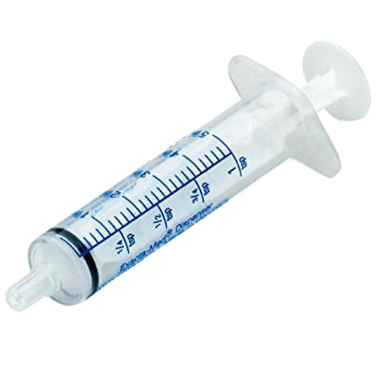White syringe with measurement markings on a white background