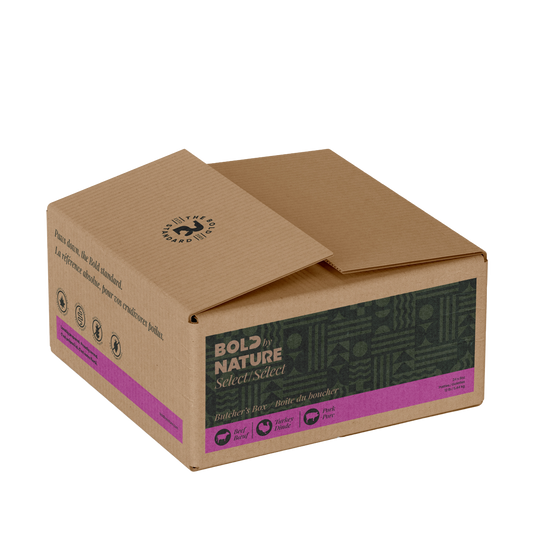Brown cardboard box with 'Bold by Nature Butcher's Box' branding on a white background