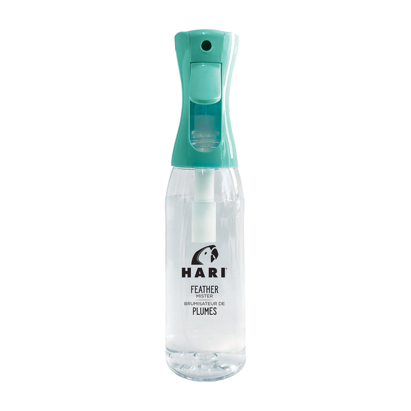 Load image into Gallery viewer, Clear spray bottle with teal top on a white background, featuring the brand &#39;Hari&#39;.
